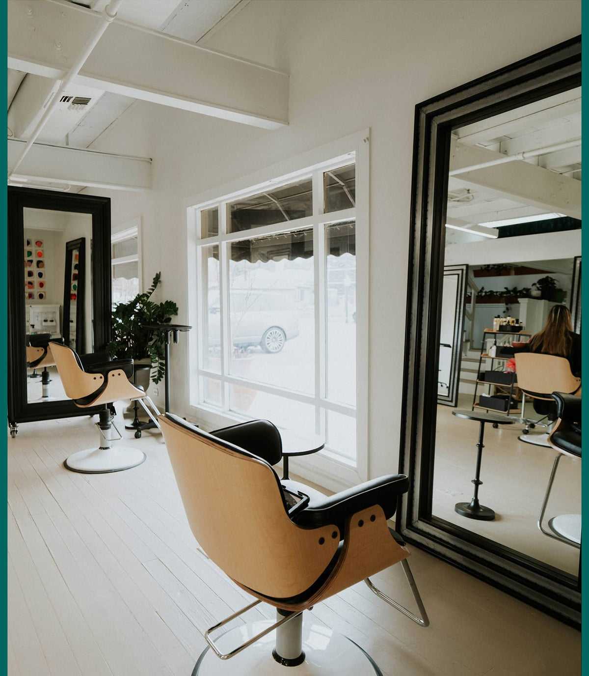 Styling chairs and mirrors in the salon at Zayda Hair & Apothecary, San Antonio TX